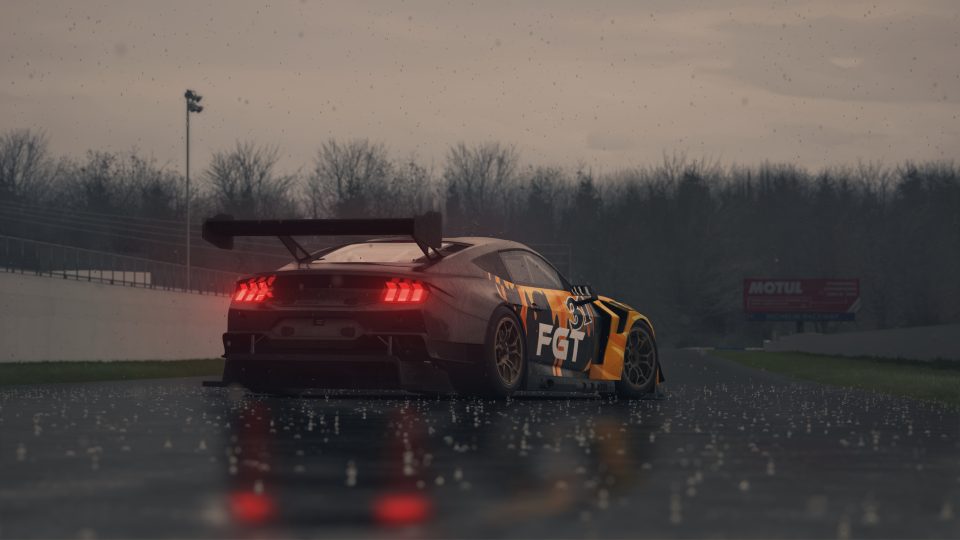a race car on a wet road