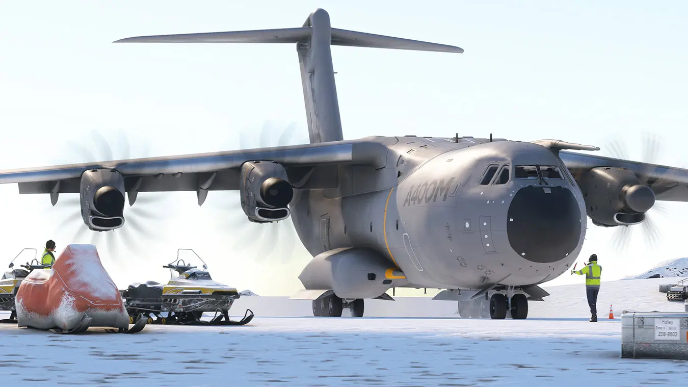 a large airplane on a snowy runway
