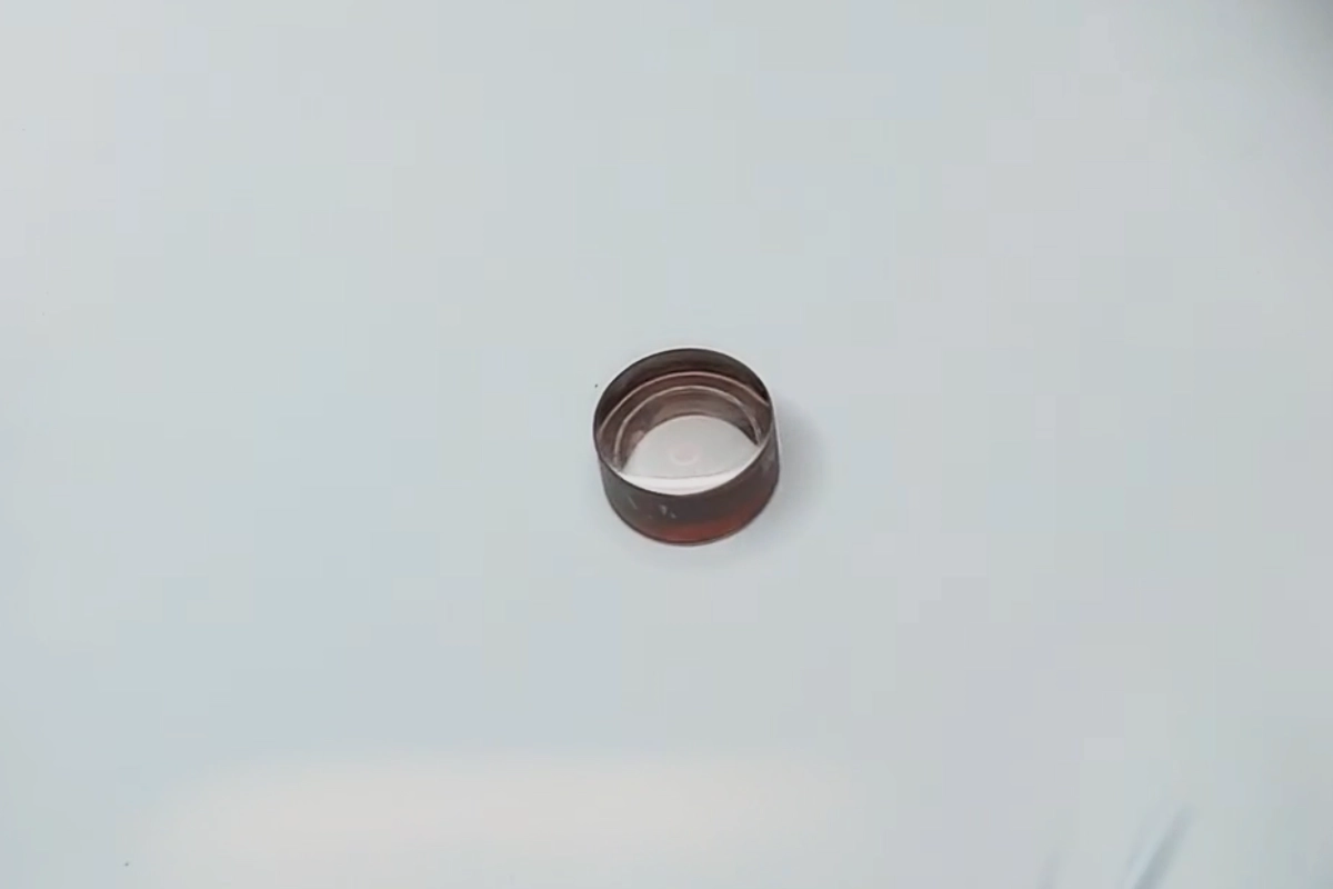 a circular object on a white surface