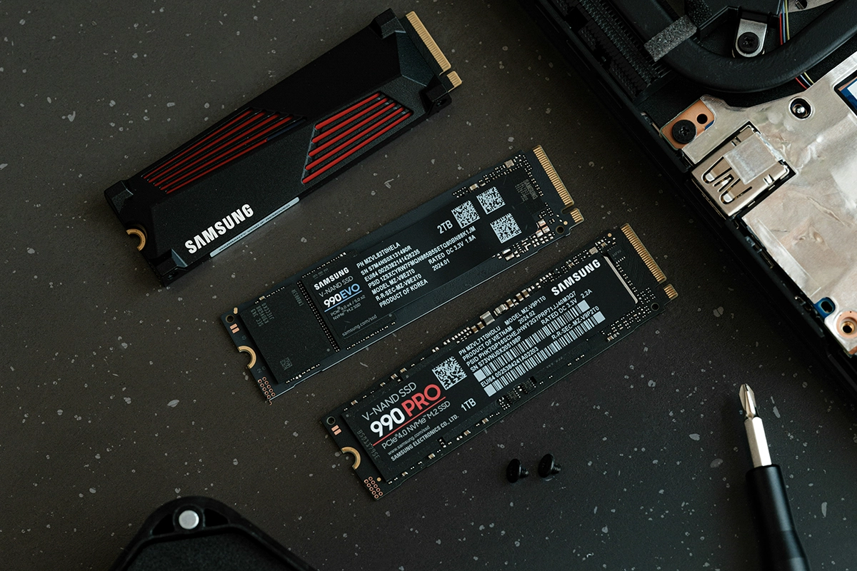 several black rectangular objects on a black surface